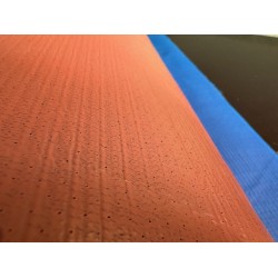 Infusion bleeder with perforated film